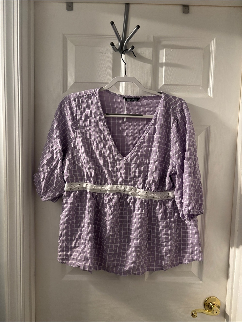 BloomChic Lavender Grid V-Neck Peplum Tunic